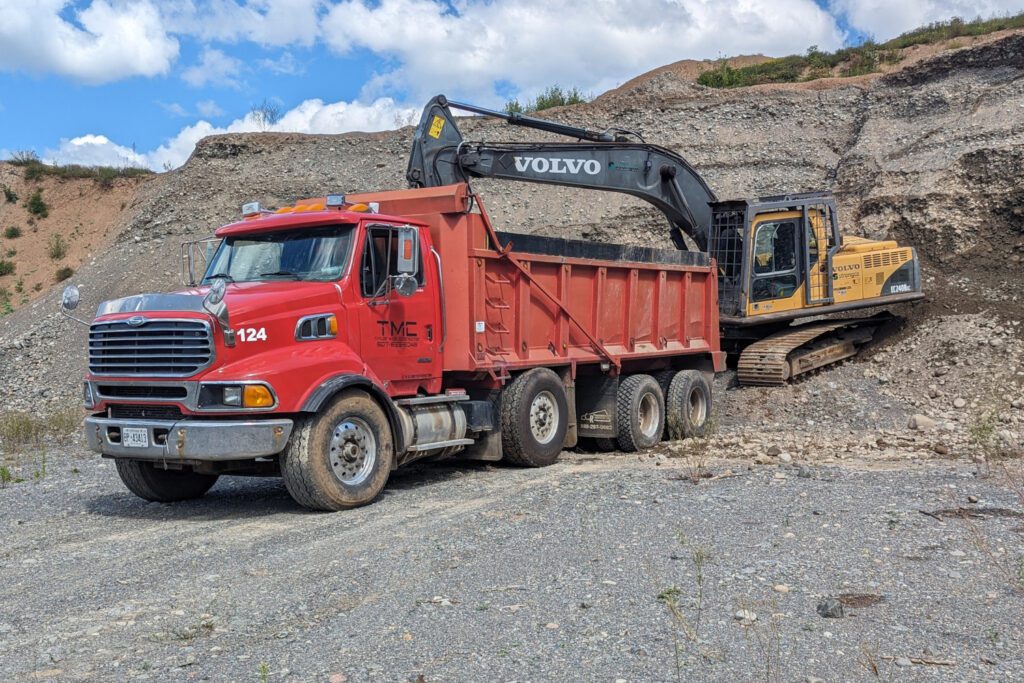Taylor Made Construction's dump truck being prepared for a haul